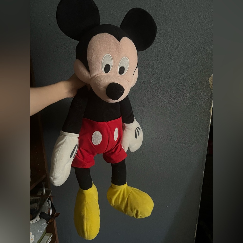 Mickey Mouse plush it’s little dusty